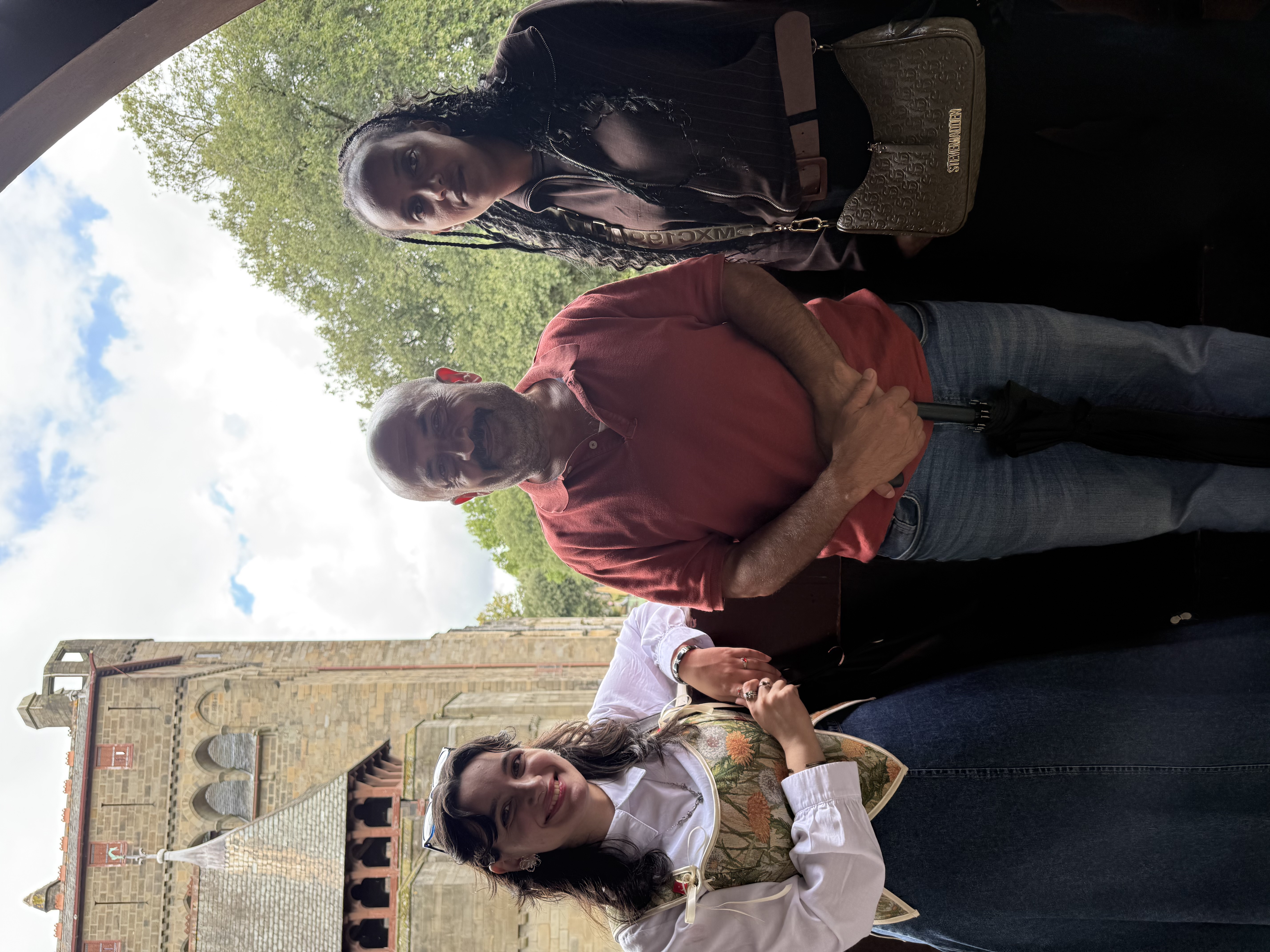 Three people together during a cultural visit